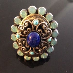 Large turquoise ring with blue center